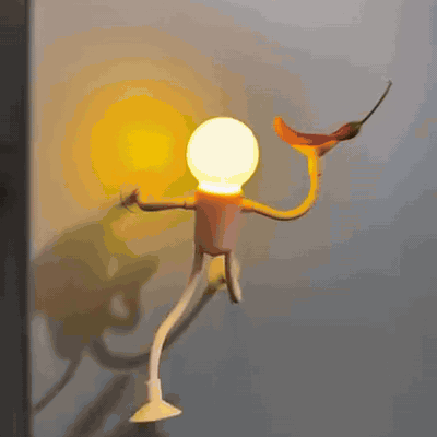 gif — Lampada Notturna Omino Flessibile con Ventose – Si Piega e Si Attacca Ovunque