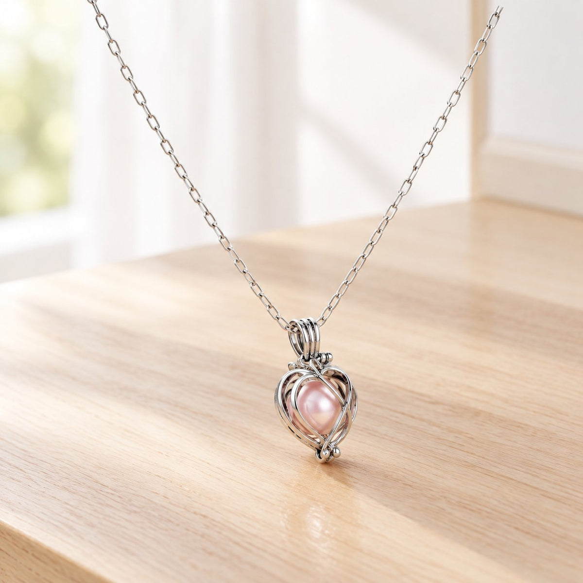 situation — Collana Cuore di Perla – Ciondolo a Gabbia con Perla Rosa