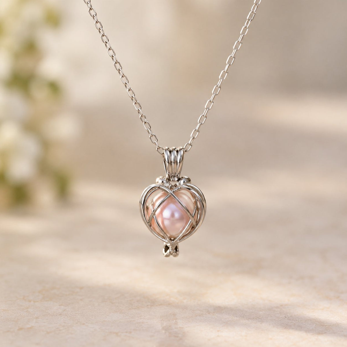 situation — Collana Cuore di Perla – Ciondolo a Gabbia con Perla Rosa